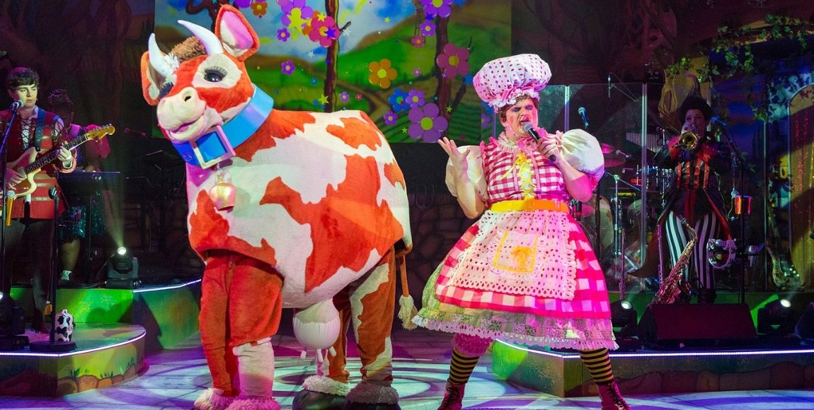 Panto at New Wolsey Theatre. Bessie the pantomime cow and Dame Dolly Durden